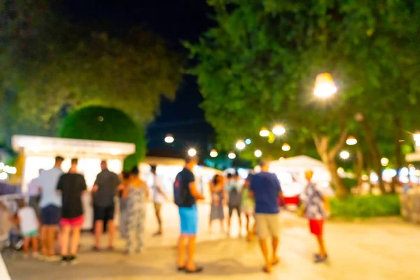 Difuminación abstracta y mercado callejero nocturno desenfocado — Foto de Stock