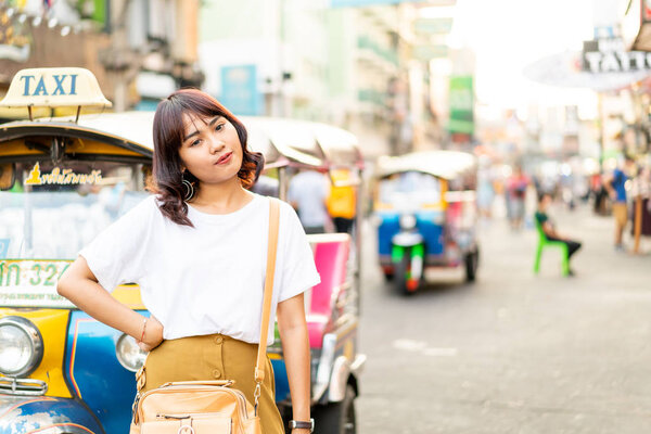Happy and Beautiful Asian woman traveling at Khao Sarn Road, Tha
