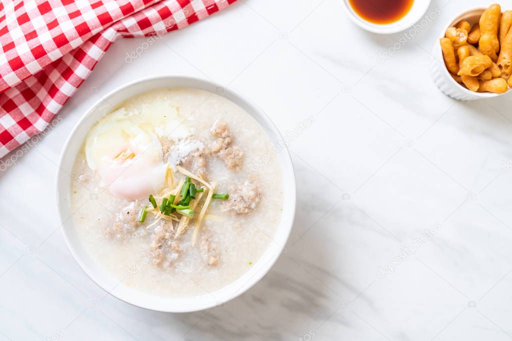 congee with minced pork in bowl 