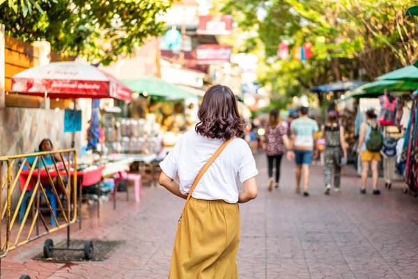 Happy and Beautiful Asian woman traveling at Khao Sarn Road, Tha
