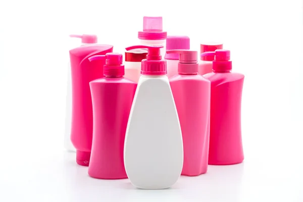 Flaska med schampo eller hår balsam på vit bakgrund — Stockfoto