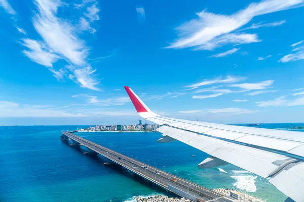 Maldives islands top view from airplane window — Stock Photo, Image