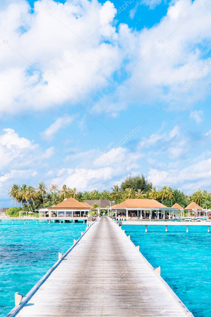 tropical Maldives resort hotel and island with beach and sea for