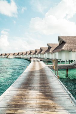 plaj ve deniz ile tropikal Maldivler tatil otel ve ada