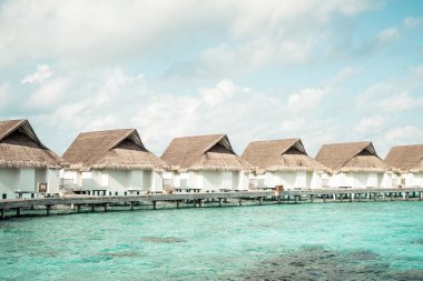 plaj ve deniz ile tropikal Maldivler tatil otel ve ada