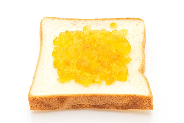Кусочки хлеба с апельсиновым джемом — стоковое фото