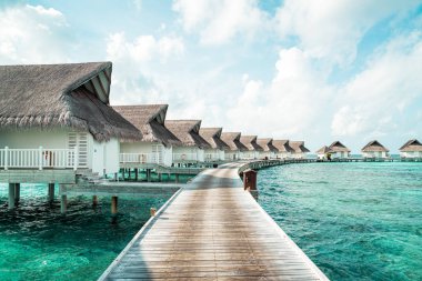 plaj ve deniz ile tropikal Maldivler tatil otel ve ada