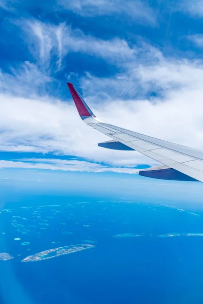 Maldives islands top view from airplane window — Stock Photo, Image