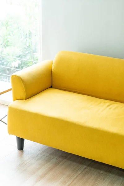 empty yellow sofa