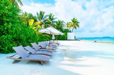 tropikal Maldivler Resort otel Adası ve deniz ile plaj sandalyesi 