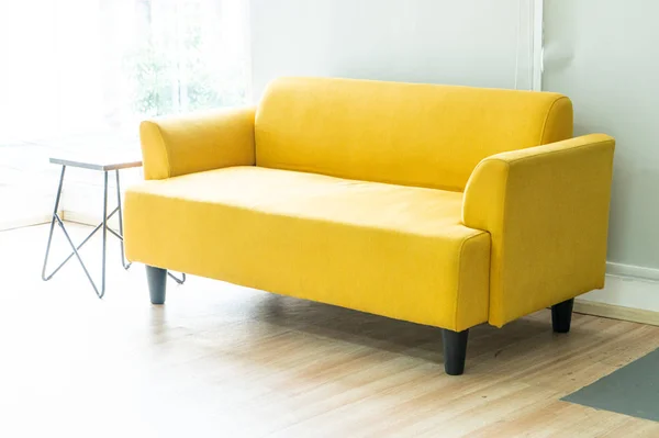 empty yellow sofa