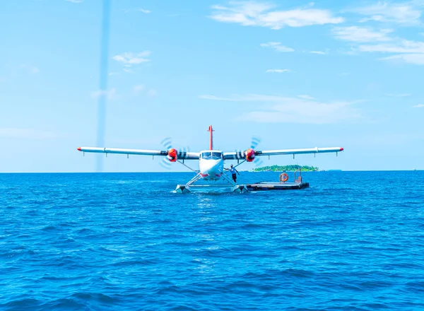 seaplane is taking off at the airport in Maldives