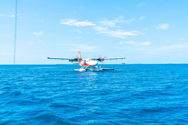 seaplane is taking off at the airport in Maldives