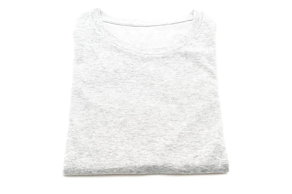 T-shirt dobrada sobre fundo branco — Fotografia de Stock