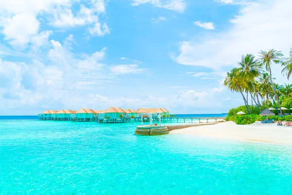 Beautiful tropical Maldives resort hotel and island with beach a