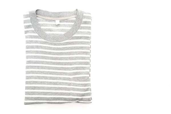 Camiseta a rayas dobladas sobre fondo blanco —  Fotos de Stock