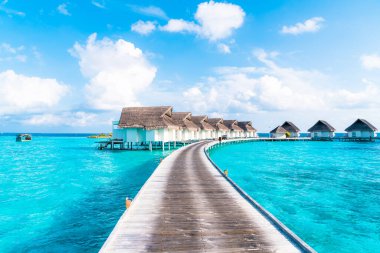 plaj ve deniz ile tropikal Maldivler tatil otel ve ada