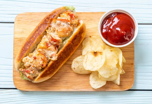 homemade lobster roll with potato chips