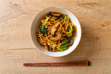 yakisoba noodles stir-fried with vegetable in asian style - vega