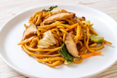 yakisoba noodles stir-fried with vegetable in asian style - vega