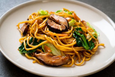 yakisoba noodles stir-fried with vegetable in asian style - vega
