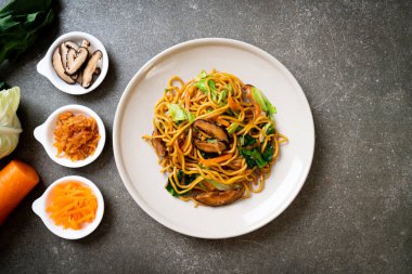 yakisoba noodles stir-fried with vegetable in asian style - vega