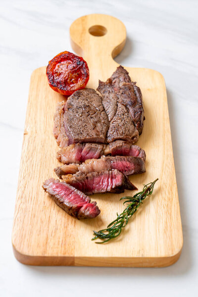 Grilled medium rare beef steak