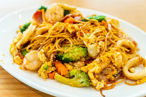 stir-fried noodles with seafood and vegetable