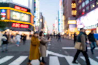 Tokyo Shinjuku 'daki soyut bulanık alışveriş caddesi, arka plan için Japonya