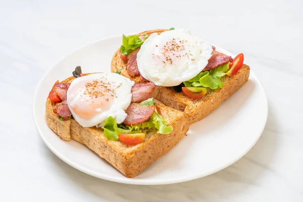 whole wheat bread toasted with vegetable, bacon and egg or egg benedict for breakfast