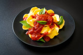 Картина, постер, плакат, фотообои "ravioli with tomato sauce and basil - italian food style", артикул 383736498