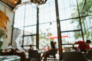 Arka plan için soyut bulanıklık ve odaklanmış kafe restoranı