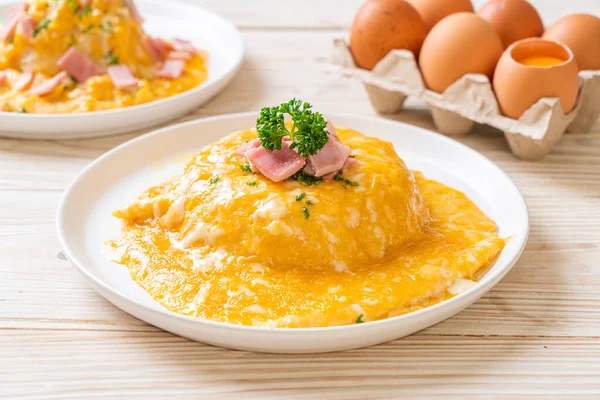 Pirinçli kremalı omlet veya jambonlu pilav ve yumuşak omlet.