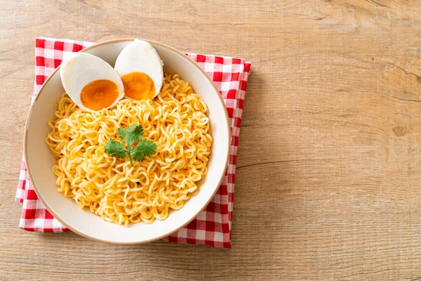 instant noodles bowl with salt egg