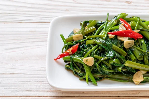 Stir Fried Chinese Morning Glory Water Spinach — стокове фото