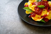 Картина, постер, плакат, фотообои "ravioli with tomato sauce and basil - italian food style", артикул 406321622
