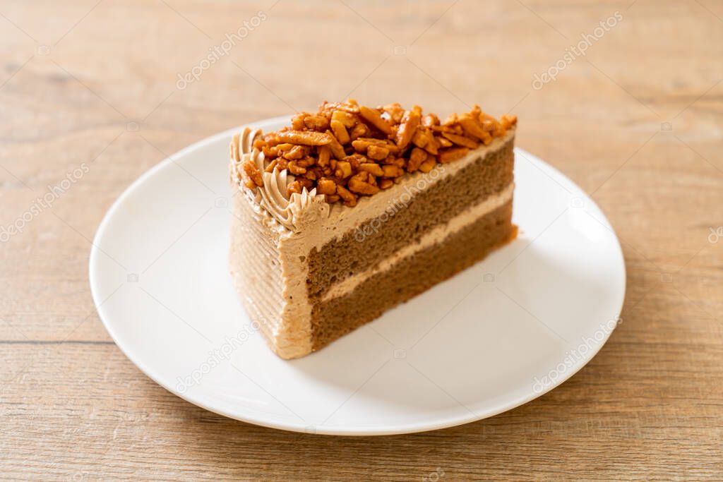 homemade coffee almonds cake on white plate