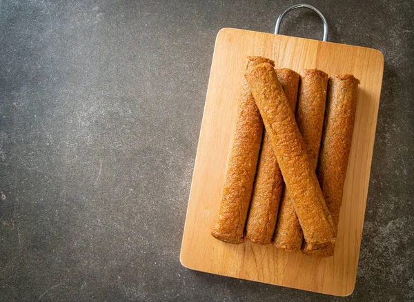 Torta Pesce Cinese Fritta Linea Palline Pesce Tavola Legno — Foto Stock