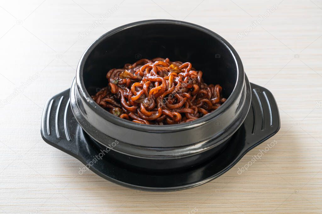 Korean black spaghetti or instant noodle with roasted chajung soybean sauce (chapagetti) - Korean food style