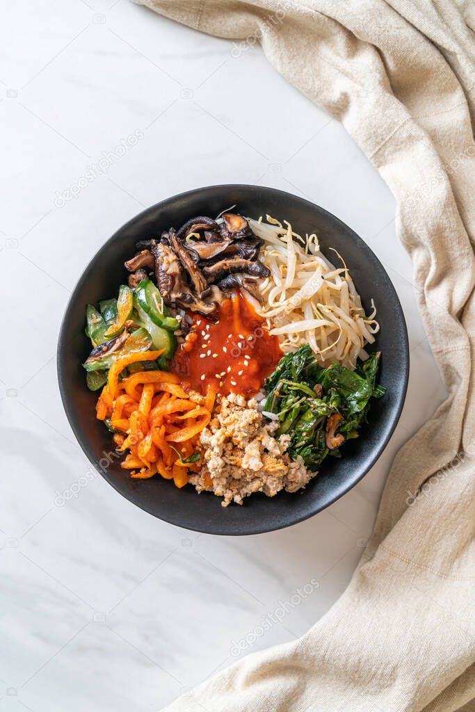 Bibimbap, Korean spicy salad with rice bowl - traditionally Korean food style