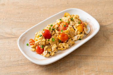 stir-fried tomatoes with egg on plate - healthy food style