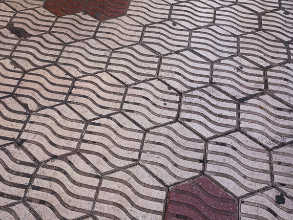 Floor of a typical sidewalk in the Eixample shopping area in Valencia, spain