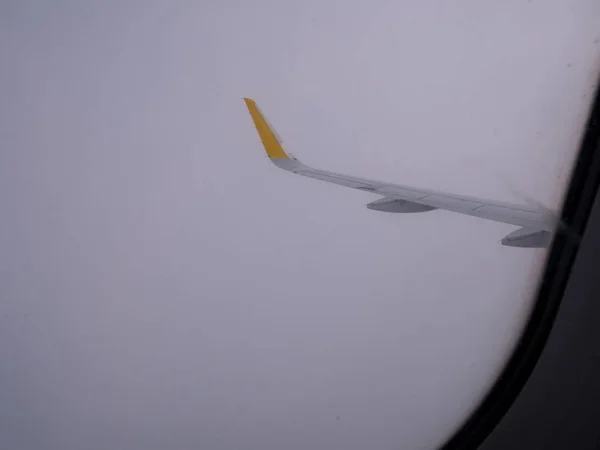 Seen from the porthole of an airliner that started from Valencia to Rome — Stock Photo, Image