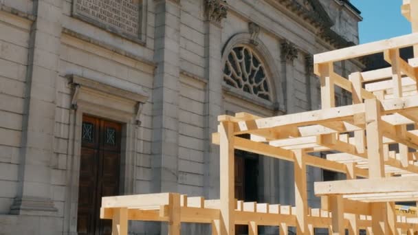 Tracking shot from wooden scaffolding at church, Annecy France — Stock Video