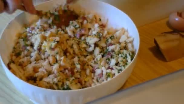 Lady prepares the dough for the typical Tyrolean dumplings — Stock Video