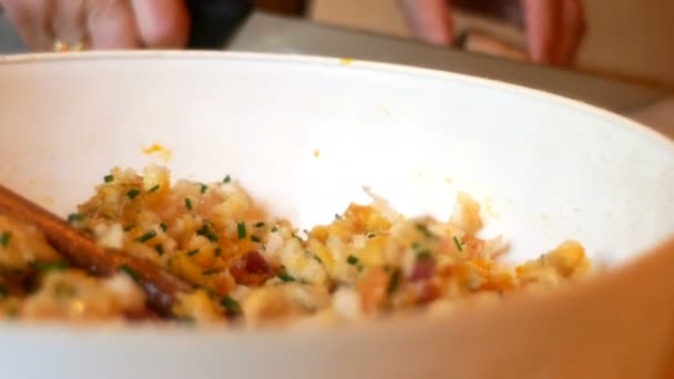 Lady prepares the dough for the typical Tyrolean dumplings — Stock Video