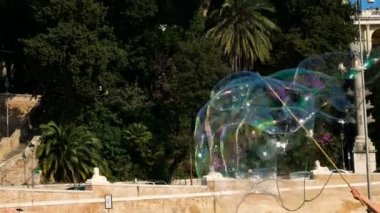 soap bubbles in Piazza del Popolo, Rome