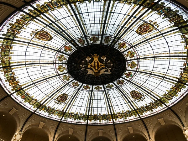 Colored glass rose window in the post office in Valencia, Spain