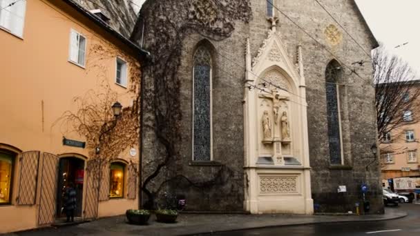 Europe, Austria, Salzburg area, view of ivy church growing on walls - San Biagio, winter time — Stock Video