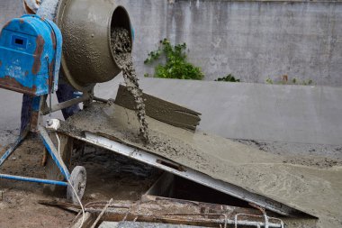 Concrete mixer at a construction site. Concreting of floors